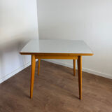 Dining table with extensions