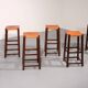 Mid-century oak bar stools with cognac leather seats