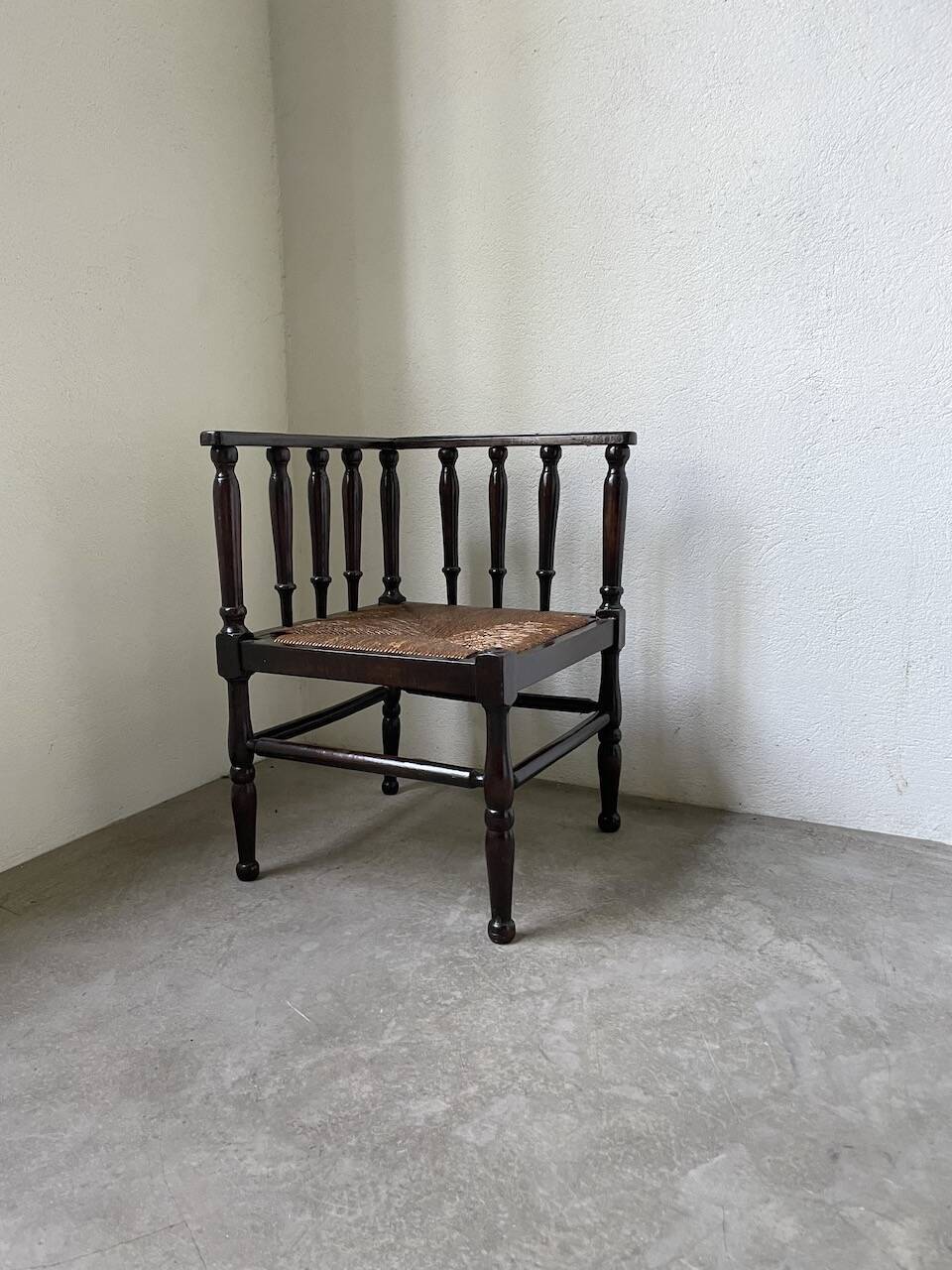 Straw chair by the fireside 1900