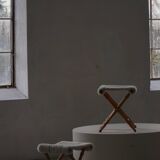 Pair of Danish mid-century folding stools with sheepskin upholstery, 1960.