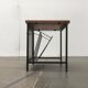 Mid-century teak side table with magazine rack.