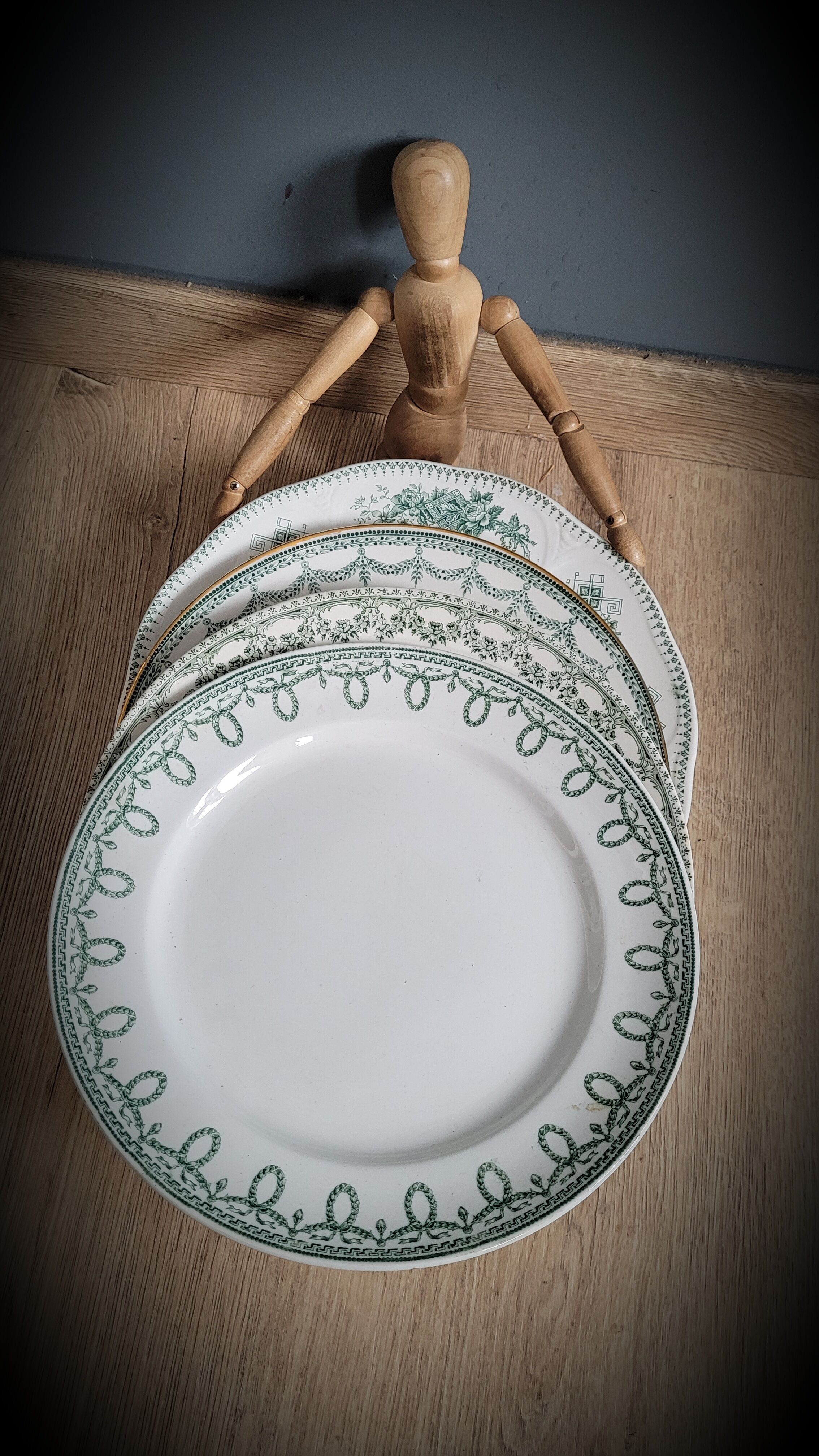 Set of 4 mismatched green plates