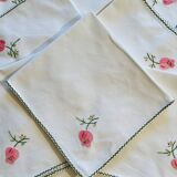 Set of 12 vintage hand-embroidered cotton white napkins.