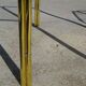 Nested table in gold metal and glass