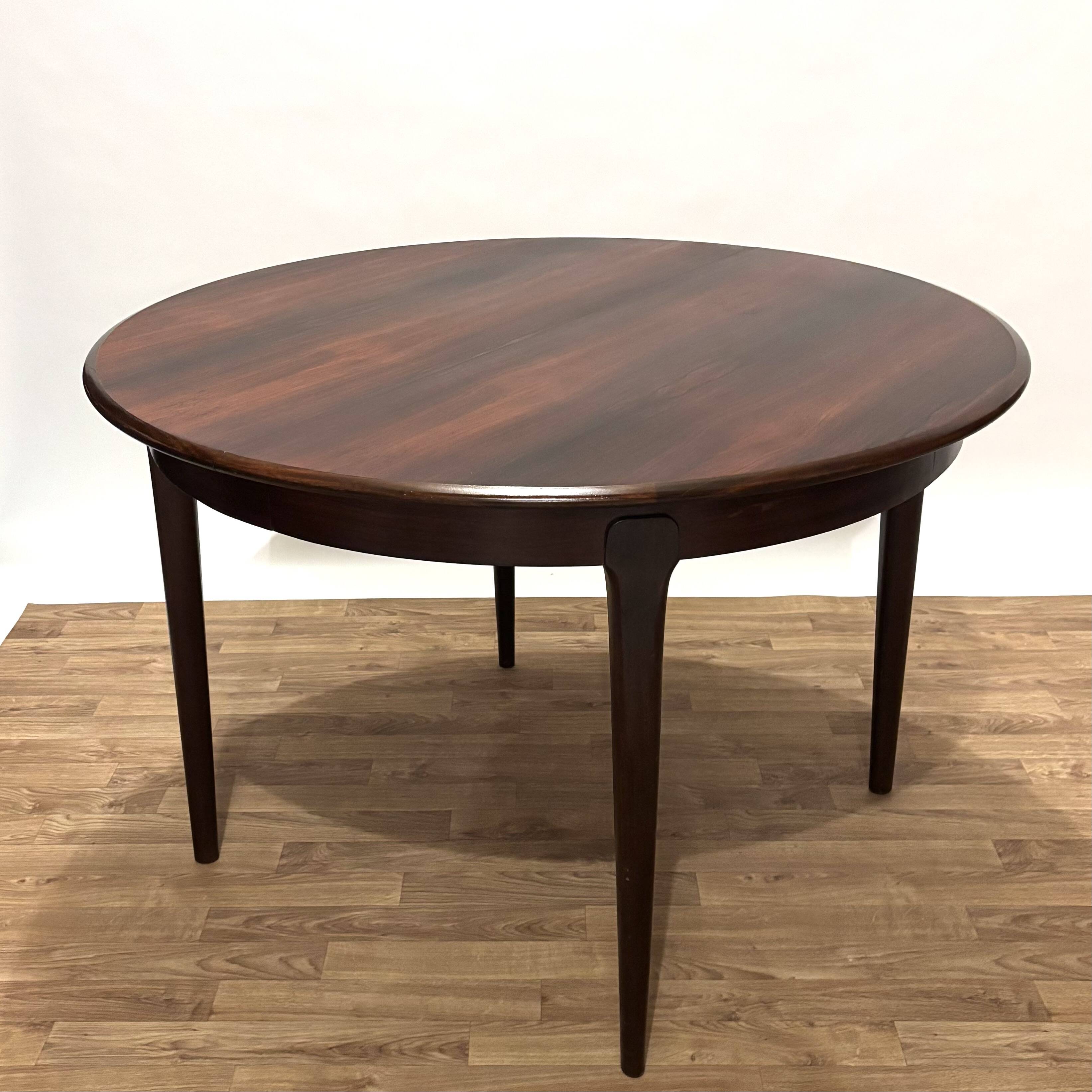Danish-style table in rio rosewood with central extension