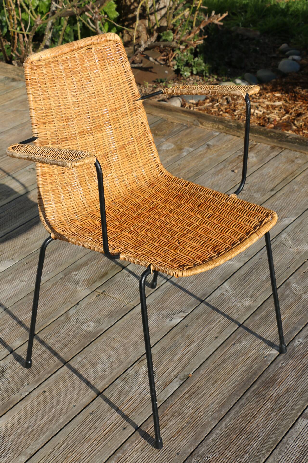 Rattan and steel armchair