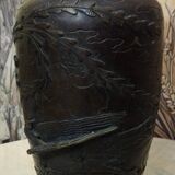Patinated bronze vase with relief decoration