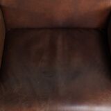 Set of 4 nicely finished dining chairs/side chairs with armrests made of cowhide leather