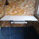 Extendable formica table and vintage 1960s chairs.
