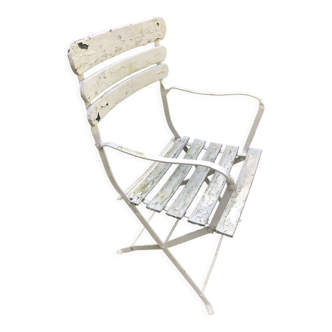Garden armchair with armrests
