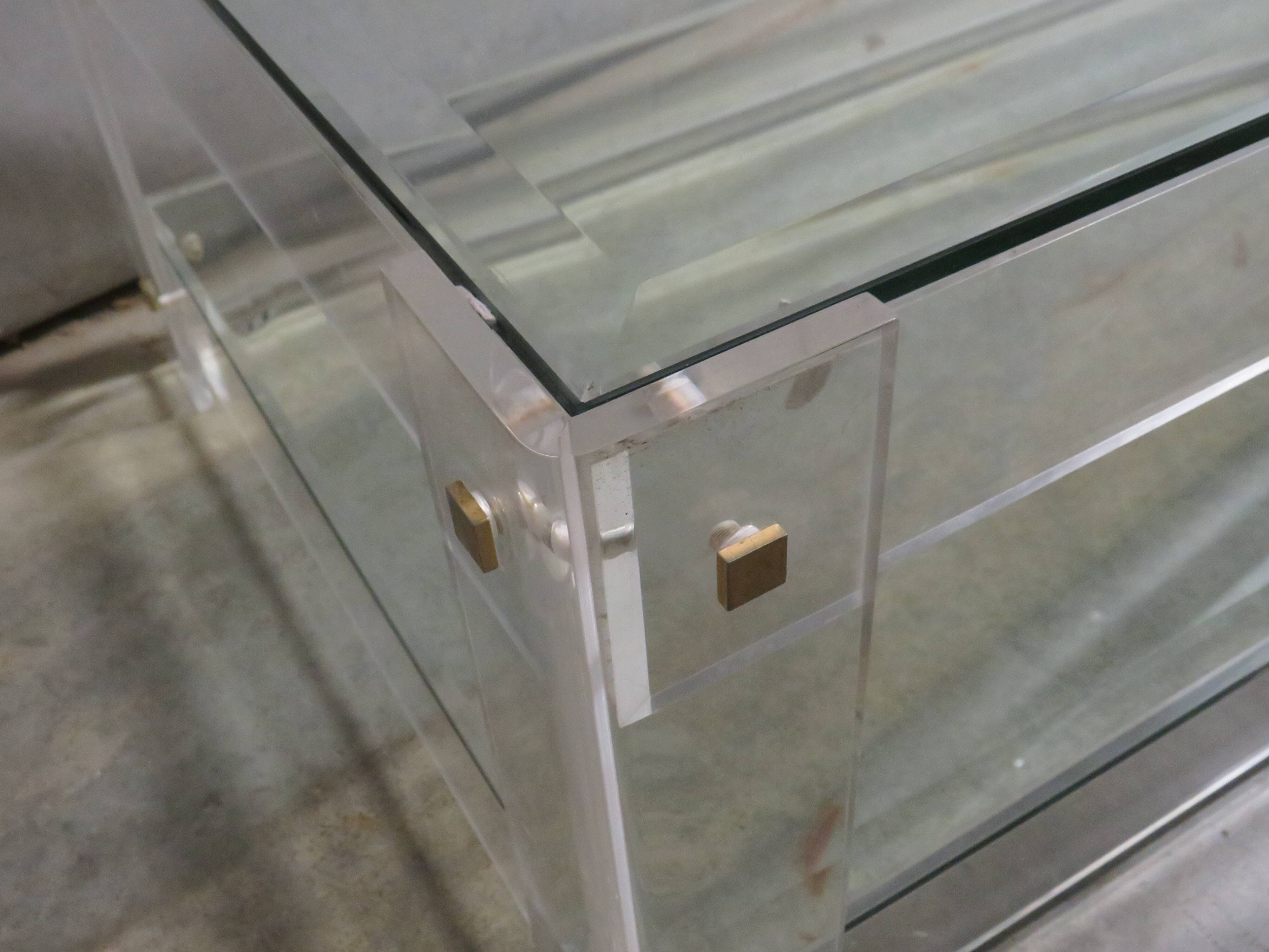 Acrylic and glass coffee table