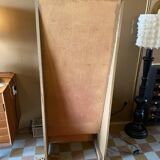 Painted wooden display shelf with an incline