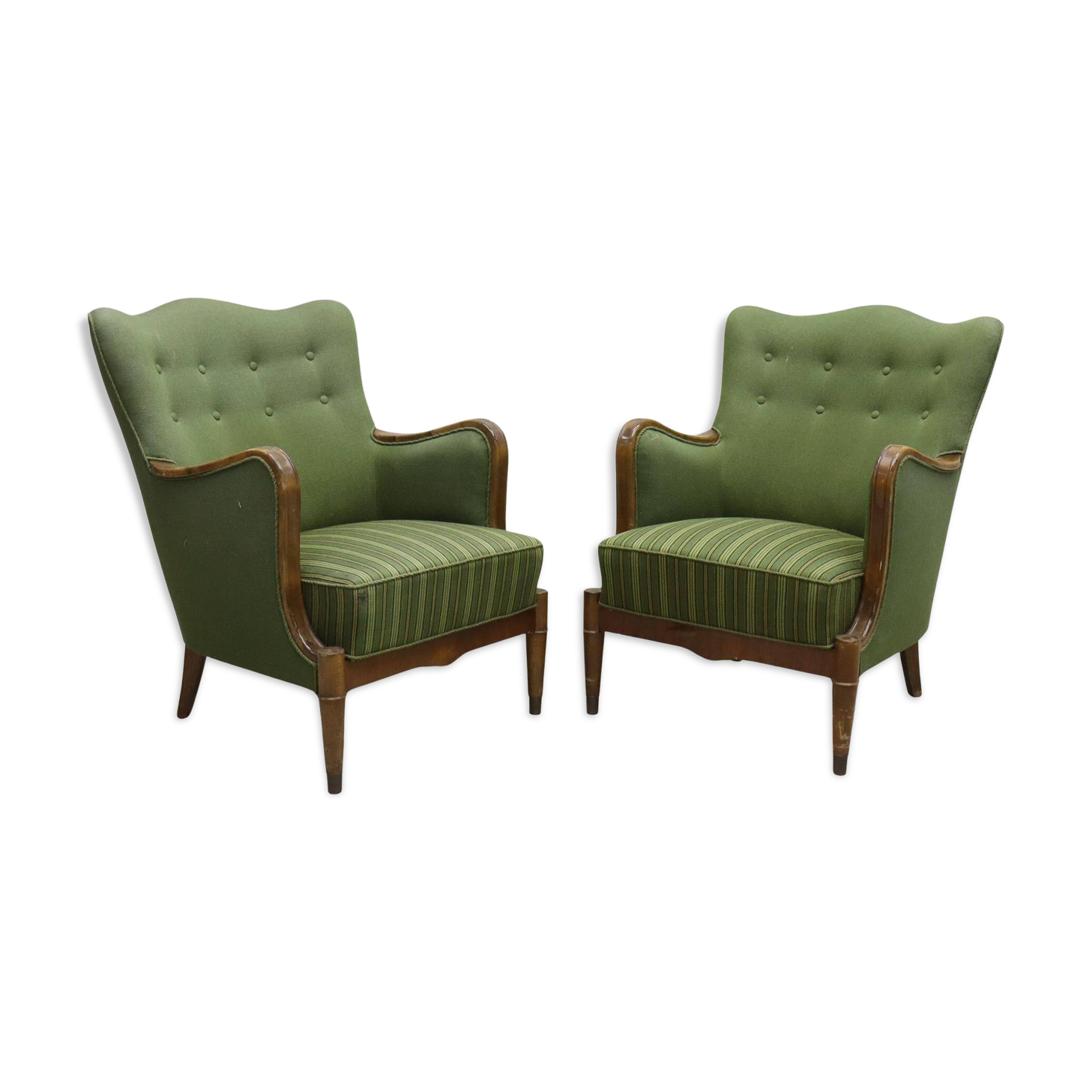 Modern Danish armchairs by Alfred Christensen. Beautiful shape, brass legs.