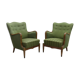 Modern Danish armchairs by Alfred Christensen. Beautiful shape, brass legs.