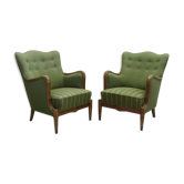 Modern Danish armchairs by Alfred Christensen. Beautiful shape, brass legs.