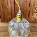 Vintage flower-shaped transparent glass pendant globe.