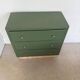 Vintage olive green chest of drawers with striped base