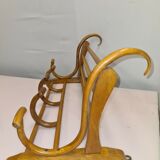 Coat rack with curved wooden hat holder