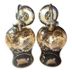 Pair of vintage wall sconces in brass with amber glass globes.