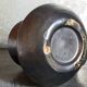 1950s iridescent black ceramic hand candle holder