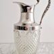 Glass and silver-plated carafe
