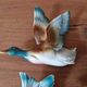 Série de 3 canards en vol en faience allemande - marque au dos