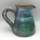 Vintage broc pitcher in enamelled sandstone with effect of blue shades, turquoise green signed