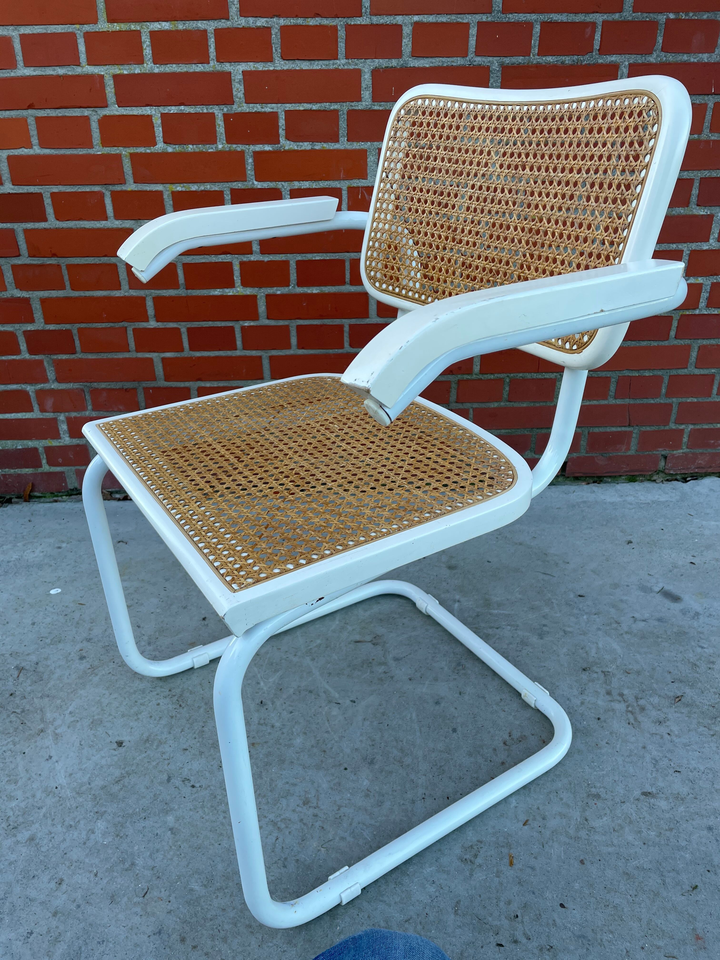 Cesca Chair model with armrest in white