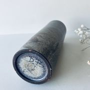 Vase tubulaire en céramique signé