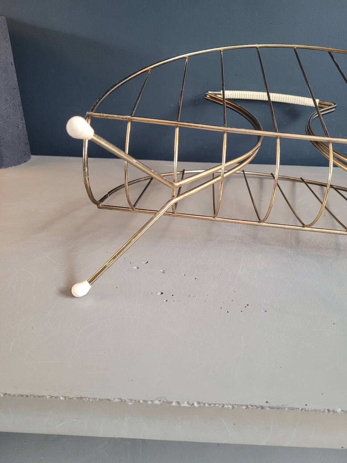 Vintage gold metal magazine rack