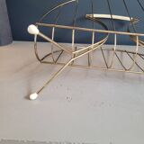 Vintage gold metal magazine rack