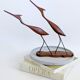 Scandinavian modernist sculpture cranes in teak.