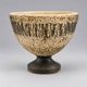 Vintage ceramic pedestal bowl – textured black and beige decor