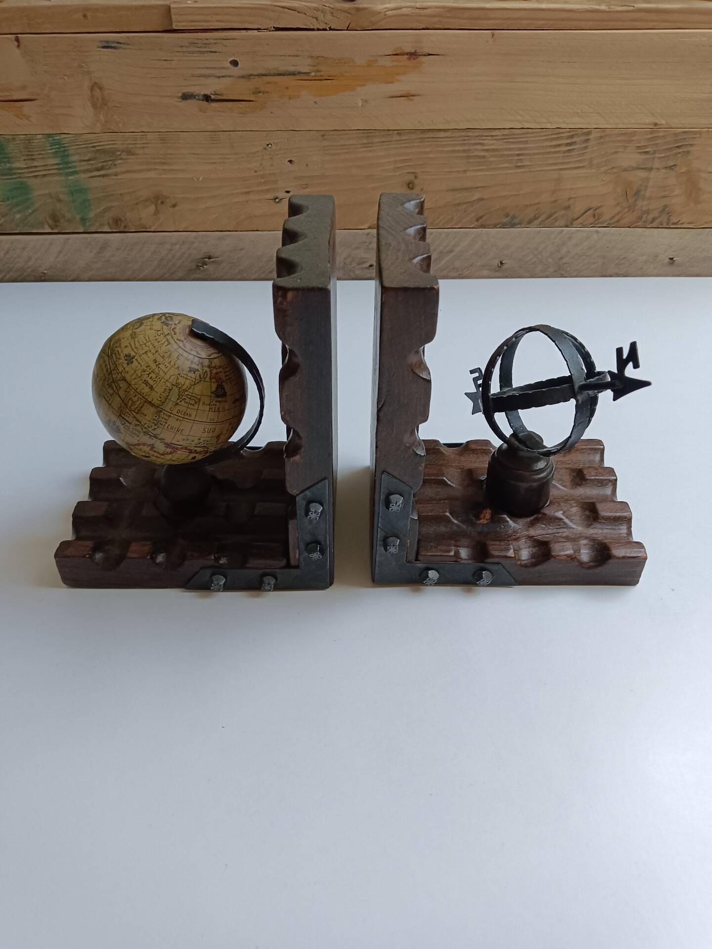 Wooden bookends globe world map