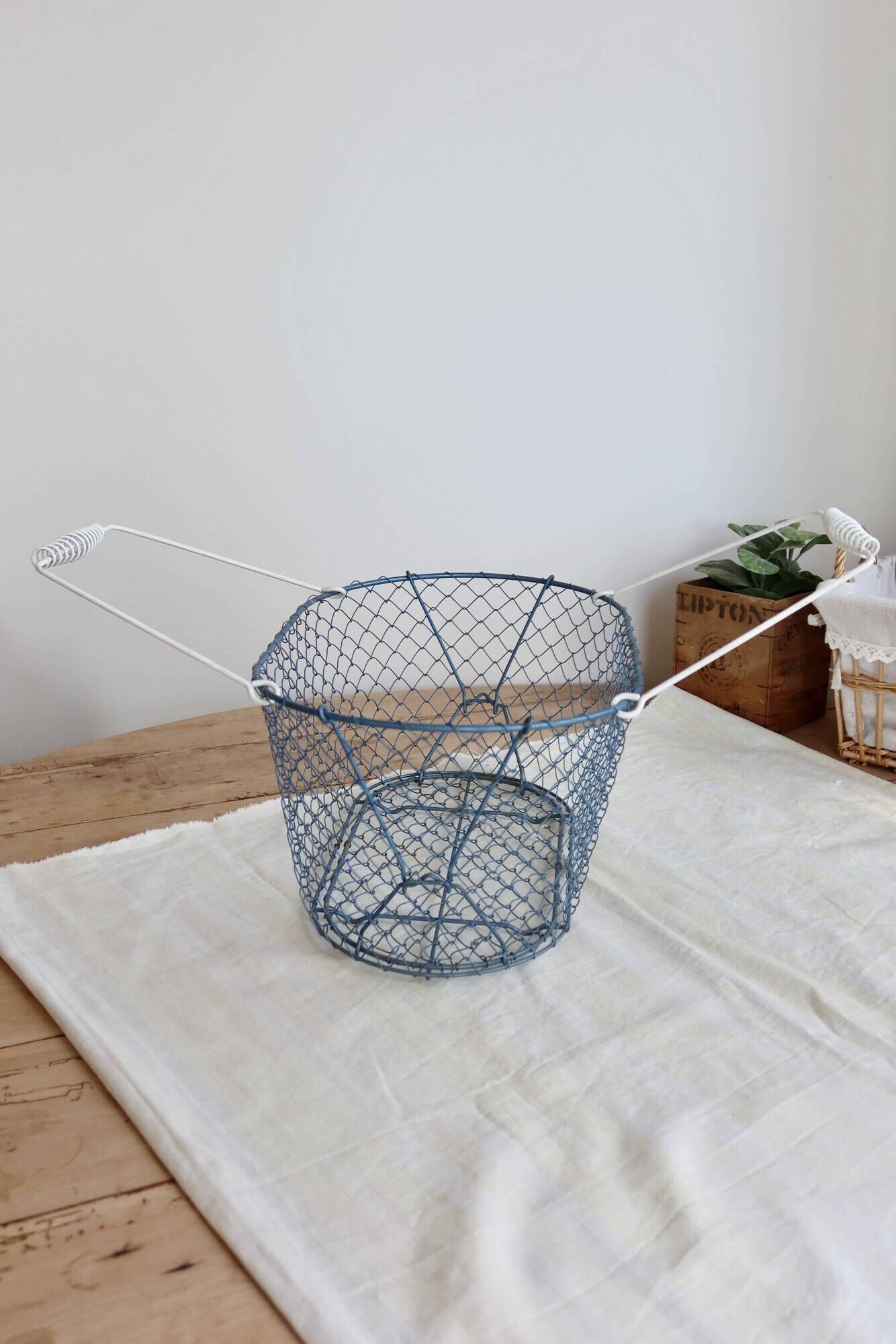 Large vintage blue wire basket
