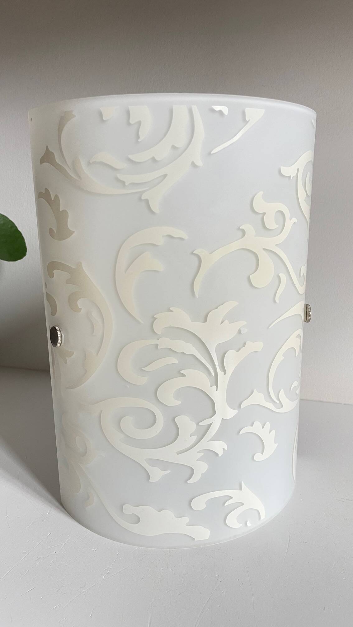 Polished and screen-printed glass sconce by eglo