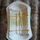 Old plate in slipware/asparagus