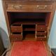 Secretary with a drop-leaf in Louis XVI style made of mahogany and royal red marble.