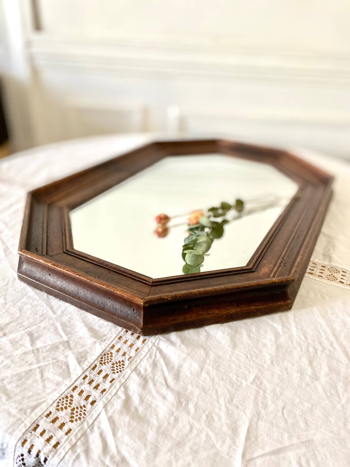 Vintage dark wood octagonal mirror