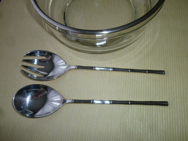 Salad bowl and silver-plated cutlery