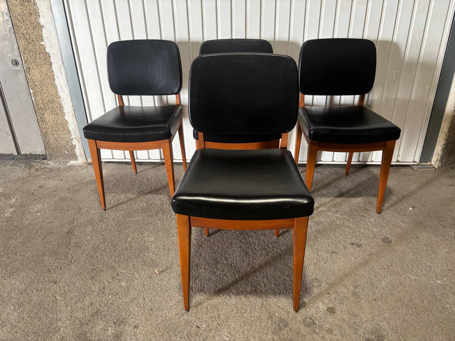 Set of 4 vintage 1960s chairs in wood and black faux leather – design