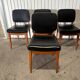 Set of 4 vintage 1960s chairs in wood and black faux leather – design