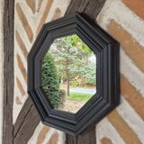 Octagonal black wood mirror