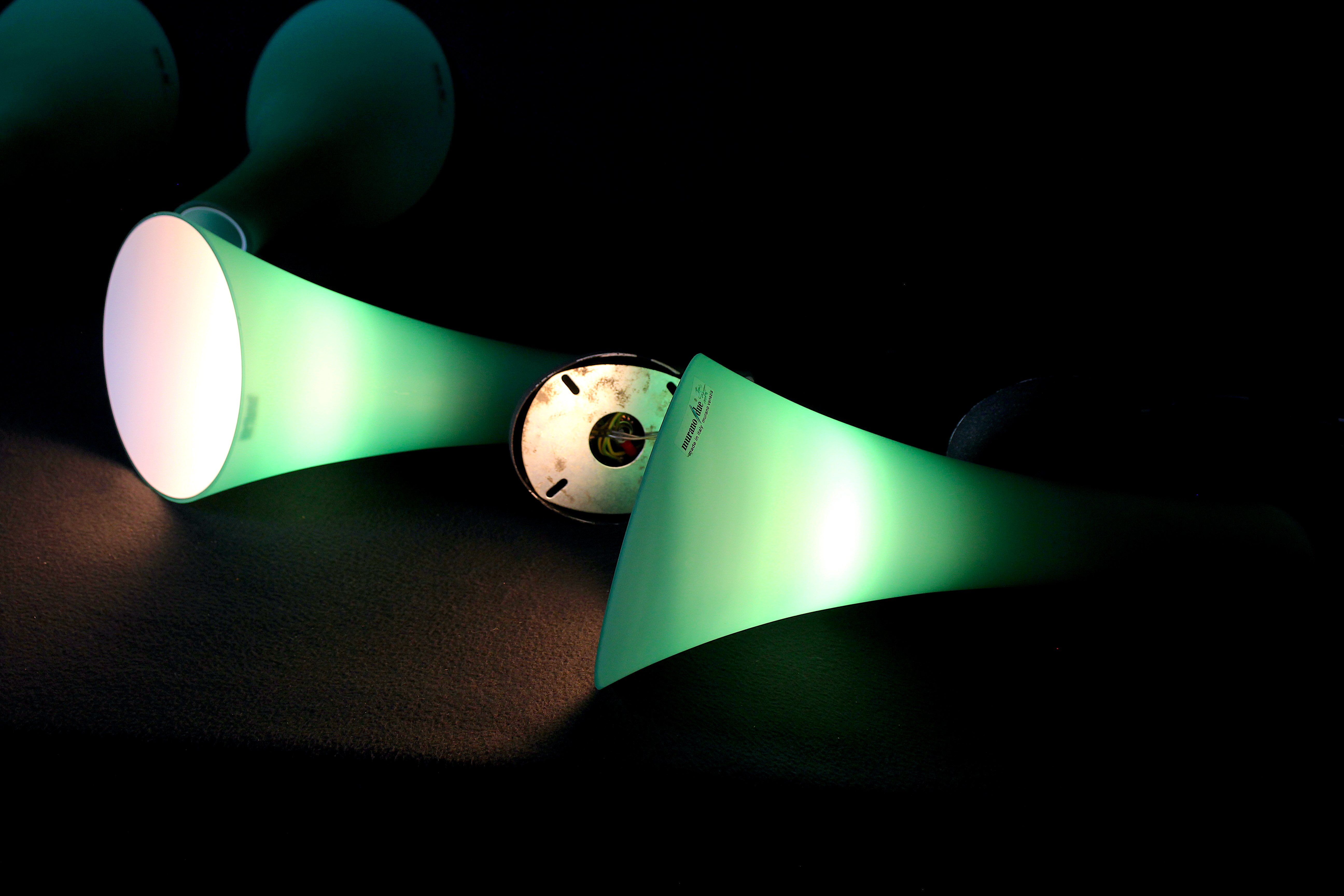 Pair of postmodern green glass wall sconces, by Carlo Nason for "murano due", Italy