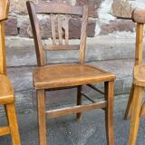4 mismatched curved wooden bistro chairs