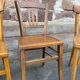 4 mismatched curved wooden bistro chairs