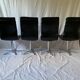 A set of four leather chairs, Italy, 80s