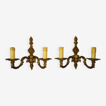 Pair of two-light wall lights in gilded bronze