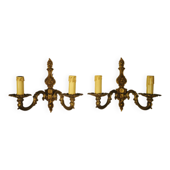 Pair of two-light wall lights in gilded bronze