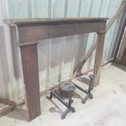Country-style fireplace surround - stained poplar - late 19th century